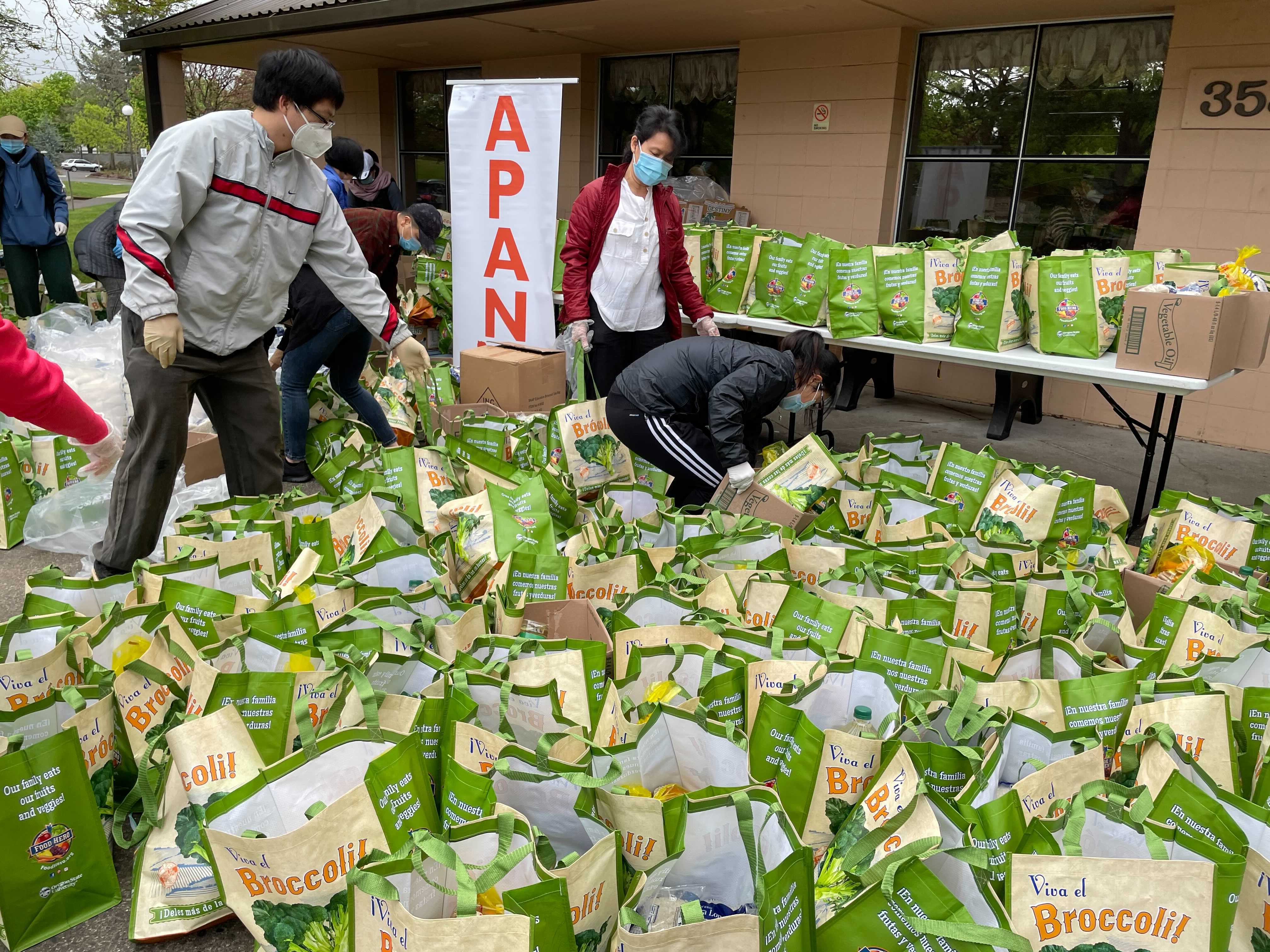 APANO staff prepares bags for their Communities United Fund