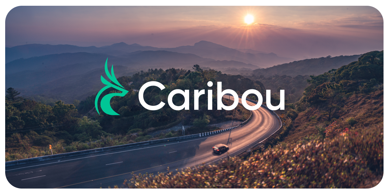Image of a car driving down the road with Caribou's logo over the top