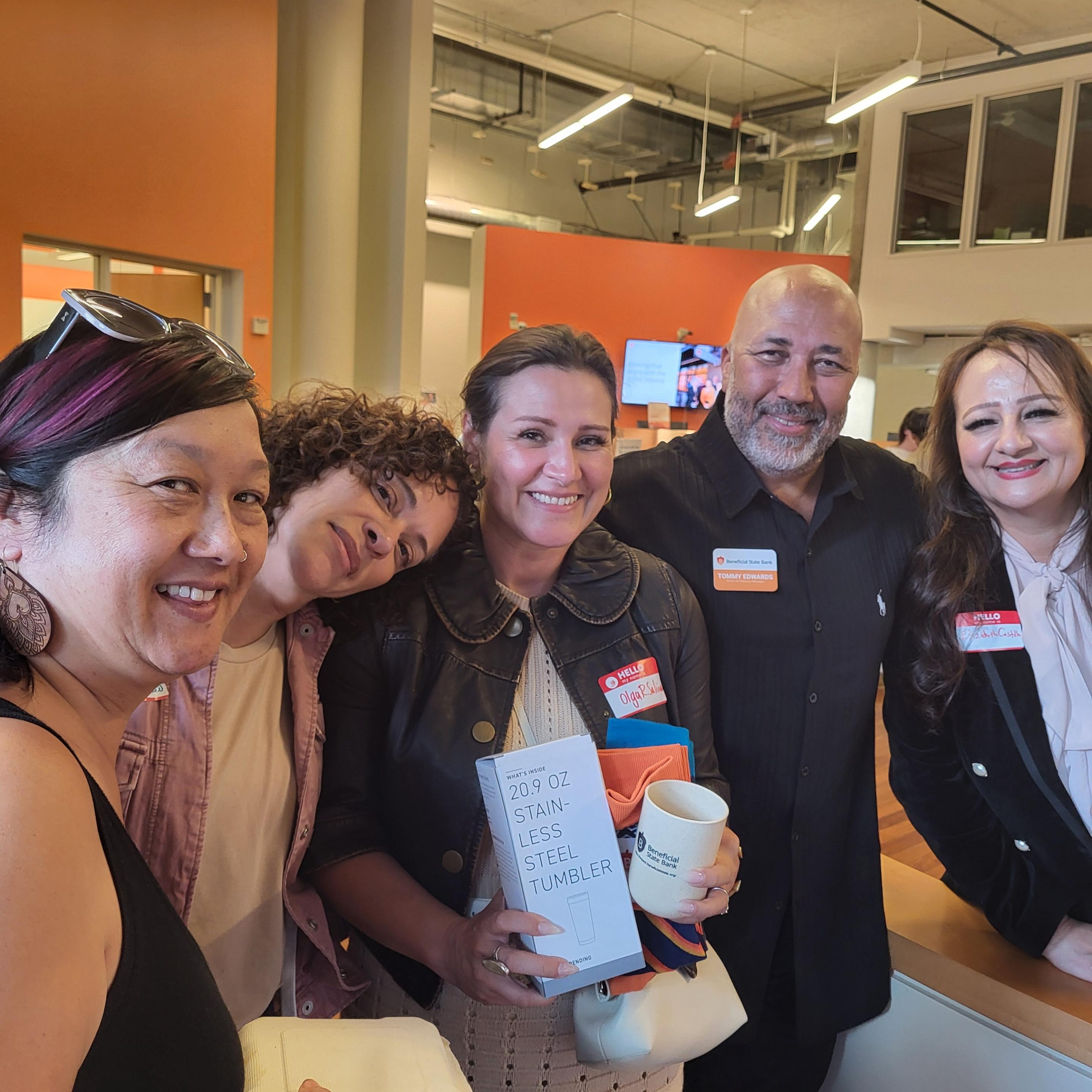 Beneficial State Bank employees and clients at an event.