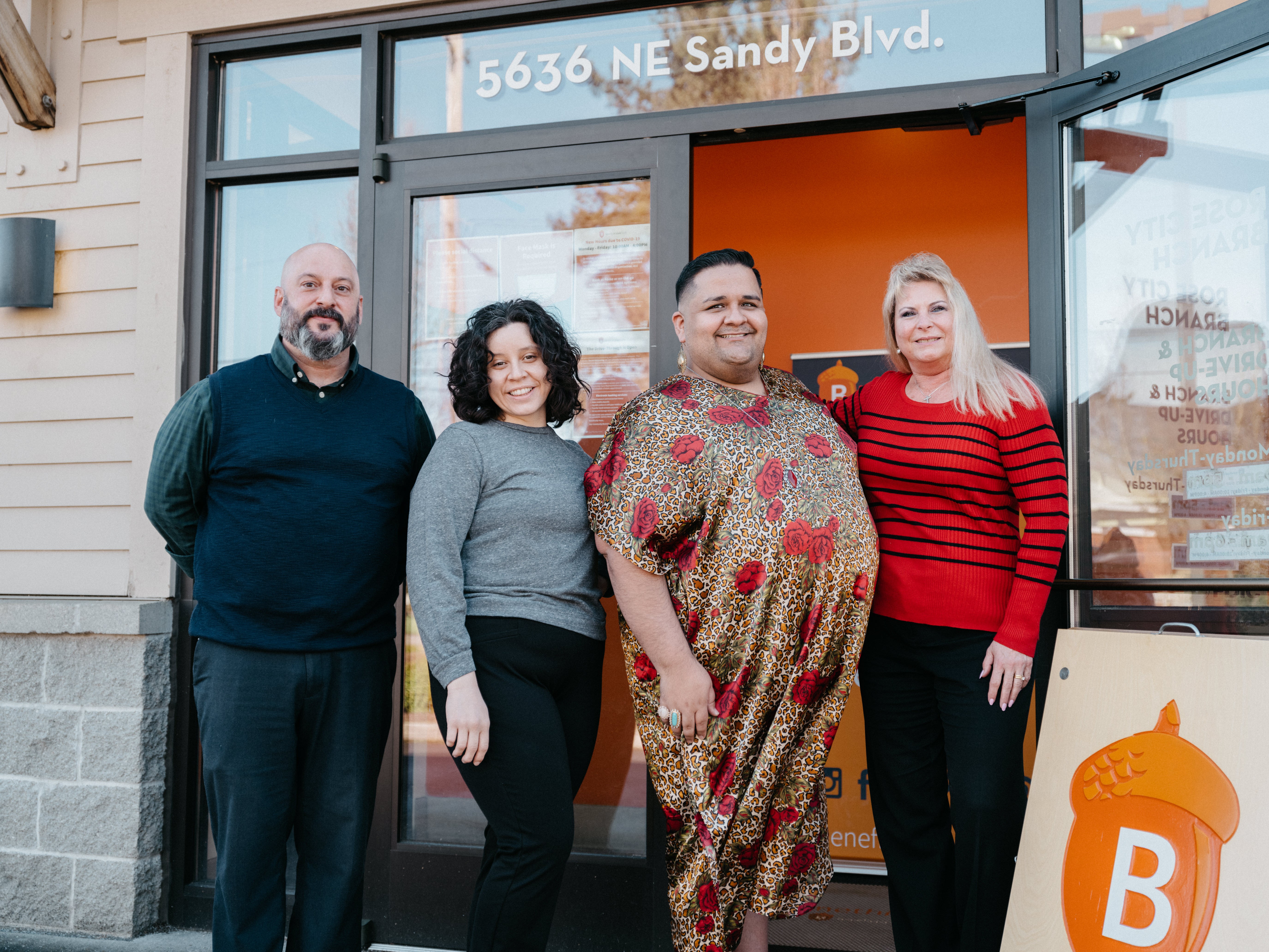 Beneficial State Bank employees smile and stand outside at the Portland - Rose City branch