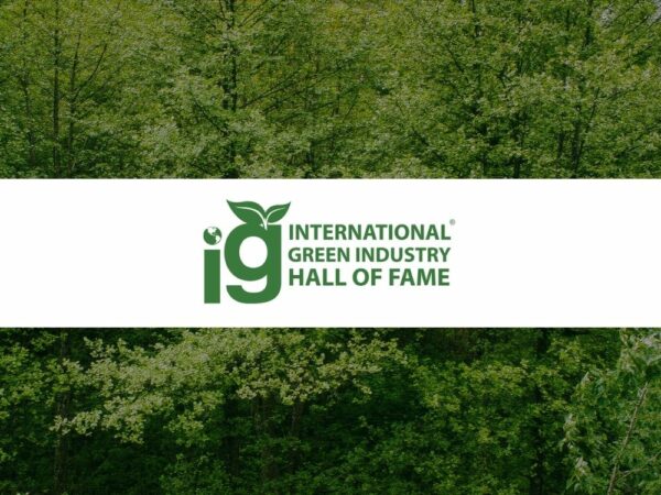 A forest, with the International Green Industry Hall of Fame logo