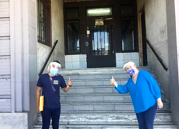Inner City Law Center staff hand delivering case settlement checks to clients over the summer. Inner City Law Center staff hand delivering case settlement checks to clients over the summer.